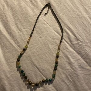 Long green necklace